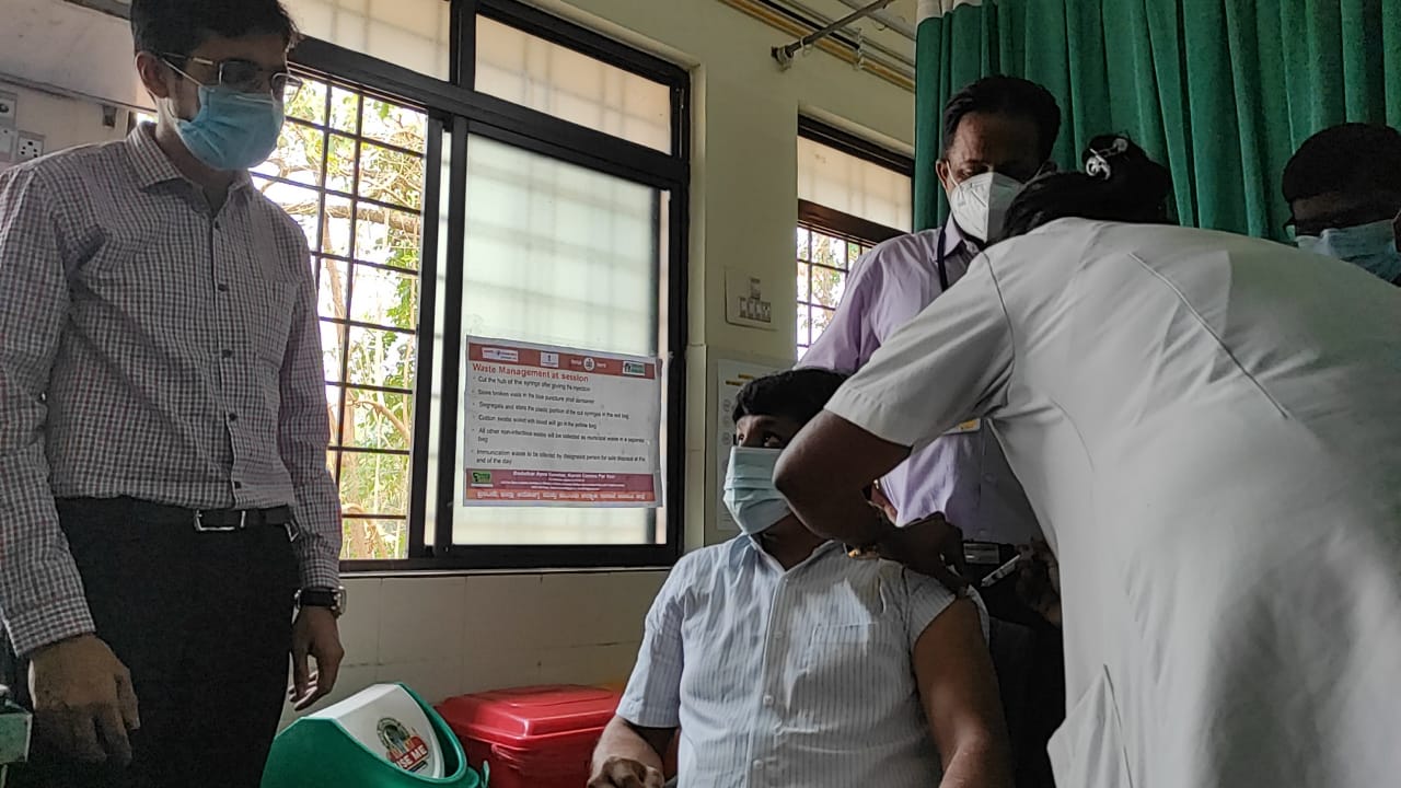 Udupi DC G Jagadeesh receiving the second dose of COVID vaccine